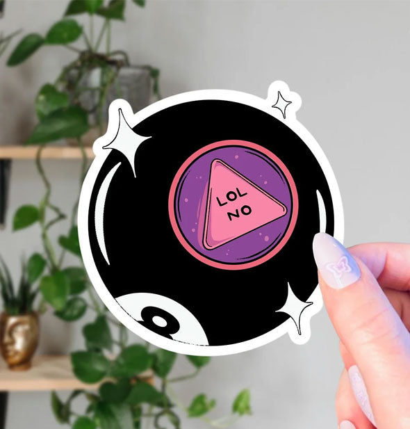 Model's hand holds a Magic 8 Ball sticker depicting the fortune, "LOL NO" in its window