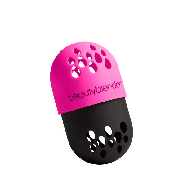 Pink and black Beautyblender case with teardrop-shaped holes for aeration
