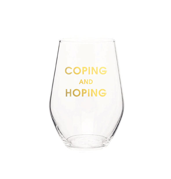 Clear stemless wine glass says, "Coping and hoping" in metallic gold foil lettering