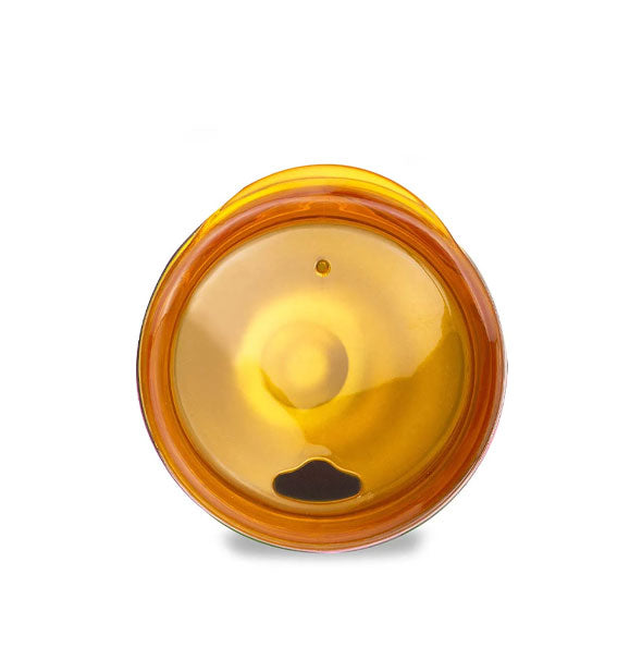 Top view of wine tumbler fitted with transparent yellow lid with openeing