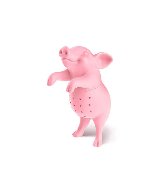 Smiling pink pig tea infuser with holes in its belly