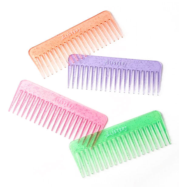 Grouping of four wide-tooth combs with glitter finishes in orange, purple, pink, and green