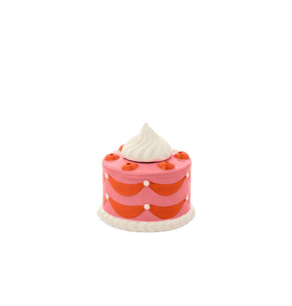 Ceramic birthday cake match holder figurine with red and white icing