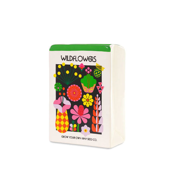 White rectangular ceramic vase with green top stripe features colorful floral artwork on a central black backdrop below the title, "Wildflowers" and small text at the bottom that says, "Grow Your Own Way Seed Co."