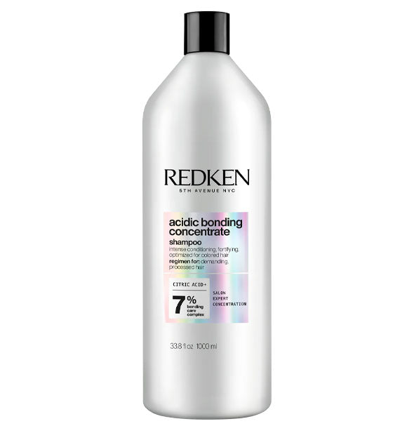 Silver 33.8 ounce bottle of Redken Acidic Bonding Concentrate Shampoo with iridescent label