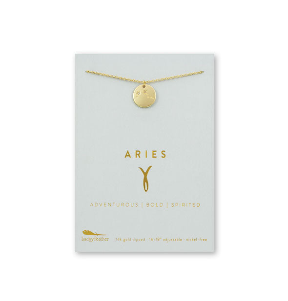 Gold Aries necklace on card with metallic gold print and symbol