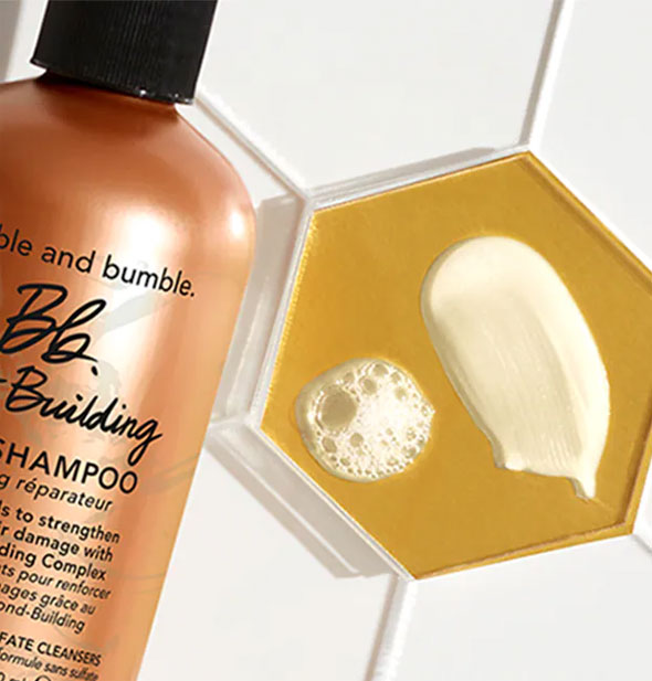 Samples of Bumble and bumble Bond-Building Repair Shampoo next to bottle