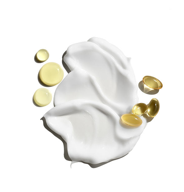 Thick application of Cool Moisture Body Lotion is staged with oil droplets and capsules