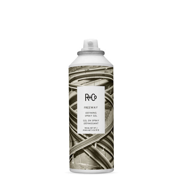 5 ounce can of R+Co Freeway Defining Spray Gel with multi-lane roadway design