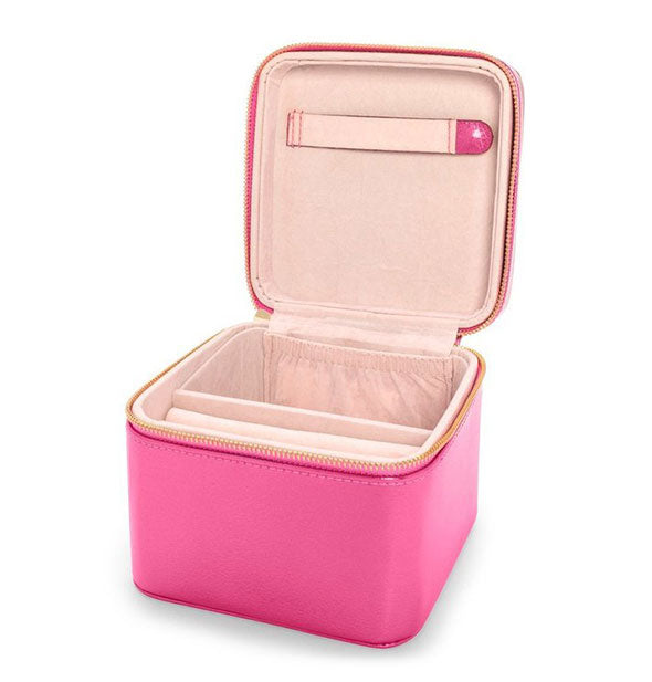 Open pink box with gold zipper and light tan interior