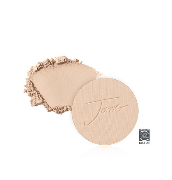 Jane Iredale PurePressed Base Mineral Foundation Refill with sample product swatch behind in the shade Natural
