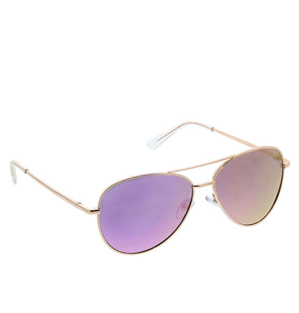 Angled view of Peepers Heat Wave Polarized Sunglasses in Pink.