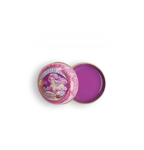 Opened round tin of purple Red Currant Gal Collection lip balm with illustration of woman with flowing hair on the lid