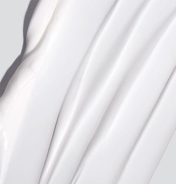 Closeup of Dermalogica Skin Smoothing Cream shows product color and consistency