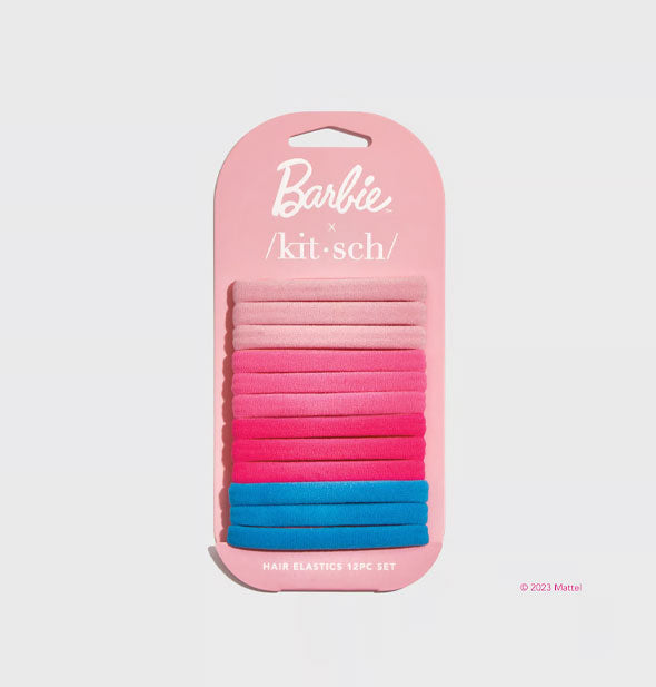 Twelve hair elastics in light pink, medium pink, dark pink, and blue on a pink Barbie x Kitsch product card
