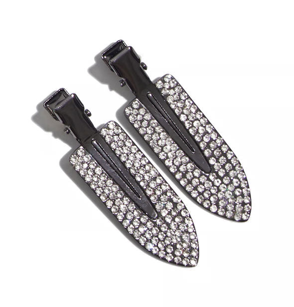 Two dark metal hair clips with surface area covered in small rhinestones