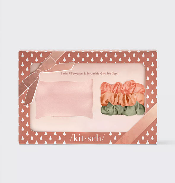 Satin Pillowcase & Scrunchie Gift Set by Kitsch is partially visible through windows in decorative tree-patterned packaging