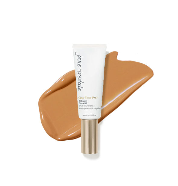White tube of Jane Iredale Glow Time Pro BB Cream with gold cap is placed in front of an enlarged product application in shade GT10