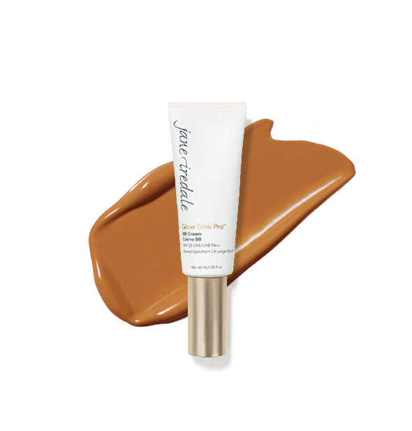 White tube of Jane Iredale Glow Time Pro BB Cream with gold cap is placed in front of an enlarged product application in shade GT11