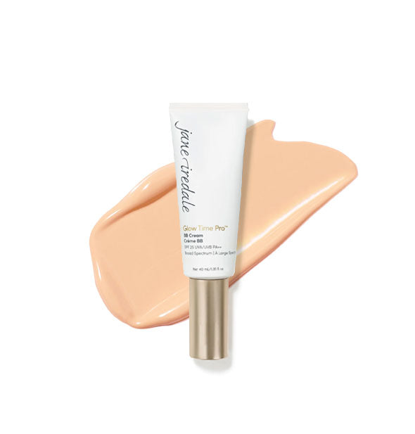 White tube of Jane Iredale Glow Time Pro BB Cream with gold cap is placed in front of an enlarged product application in shade GT3