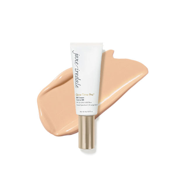 White tube of Jane Iredale Glow Time Pro BB Cream with gold cap is placed in front of an enlarged product application in shade GT4
