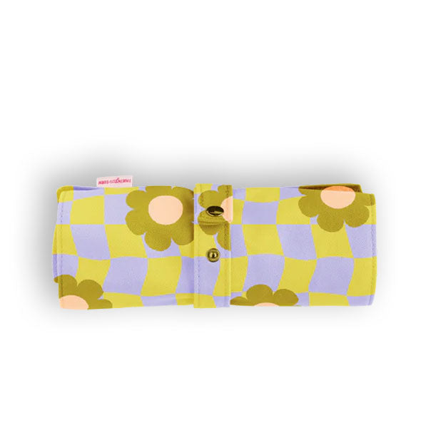 Lime green and periwinkle checker print brush storage roll with olive green and pastel coral daisy accents and a strap with snap button closure