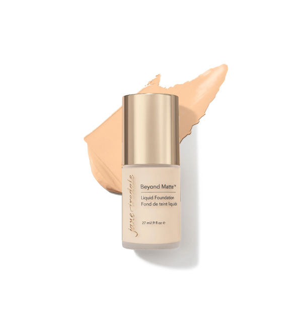 27 ml bottle of Jane Iredale Beyond Matte Liquid Foundation with sample application behind it in the shade M1