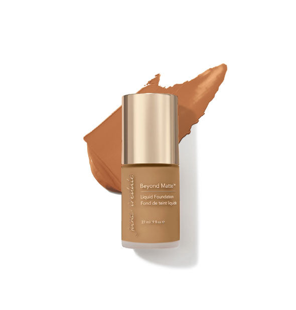 27 ml bottle of Jane Iredale Beyond Matte Liquid Foundation with sample application behind it in the shade M13