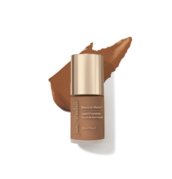 27 ml bottle of Jane Iredale Beyond Matte Liquid Foundation with sample application behind it in the shade M14