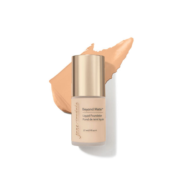 27 ml bottle of Jane Iredale Beyond Matte Liquid Foundation with sample application behind it in the shade M2