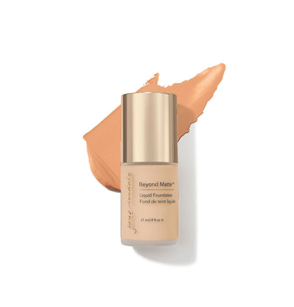 27 ml bottle of Jane Iredale Beyond Matte Liquid Foundation with sample application behind it in the shade M3