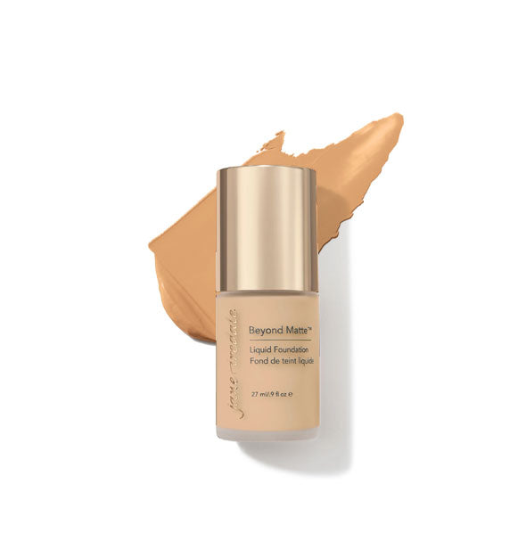 27 ml bottle of Jane Iredale Beyond Matte Liquid Foundation with sample application behind it in the shade M7