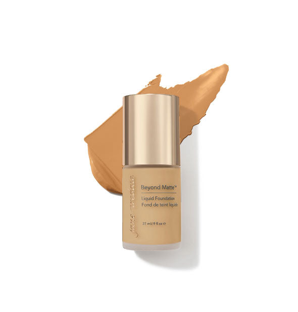 27 ml bottle of Jane Iredale Beyond Matte Liquid Foundation with sample application behind it in the shade M9