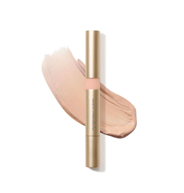 Gold tube of Jane Iredale Active Light Concealer with sample product application underneath in the shade No. 4 - Medium Peach