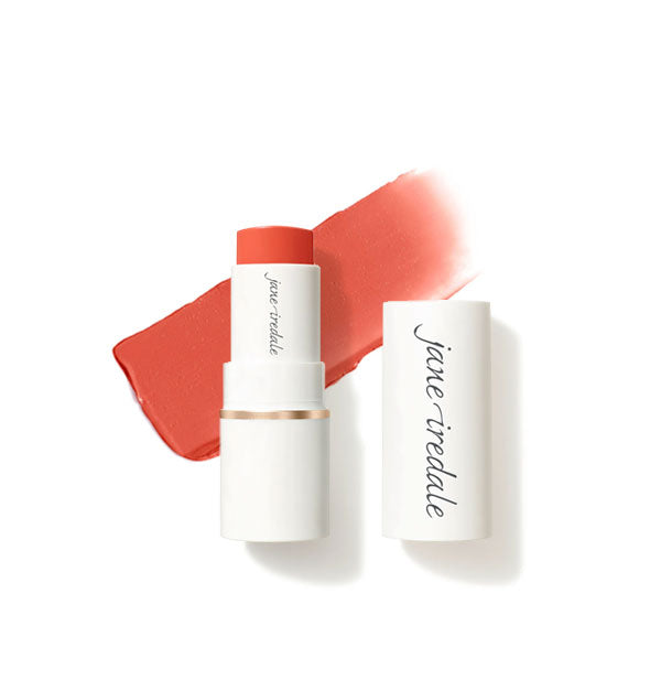 White tube of Jane Iredale Glow Time Blush Stick with cap removed and sample product application behind in matte shade Afterglow