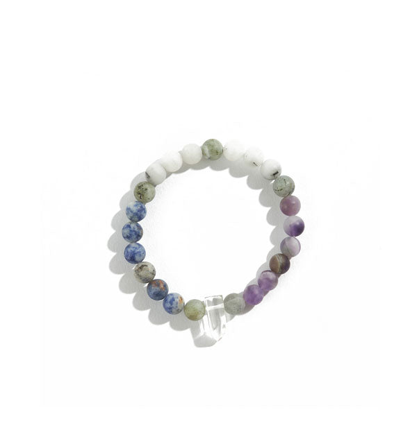 Crystal bead bracelet with blue, gray, white, and purple color scheme around a clear crystal point