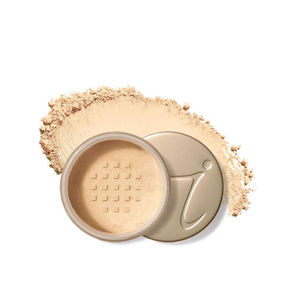 An open compact of Jane Iredale Amazing Matte Loose Finishing Powder with product swatch behind to show pigment and texture