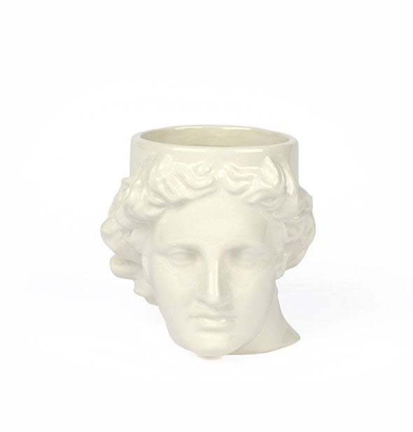 White ceramic Apollo head coffee mug