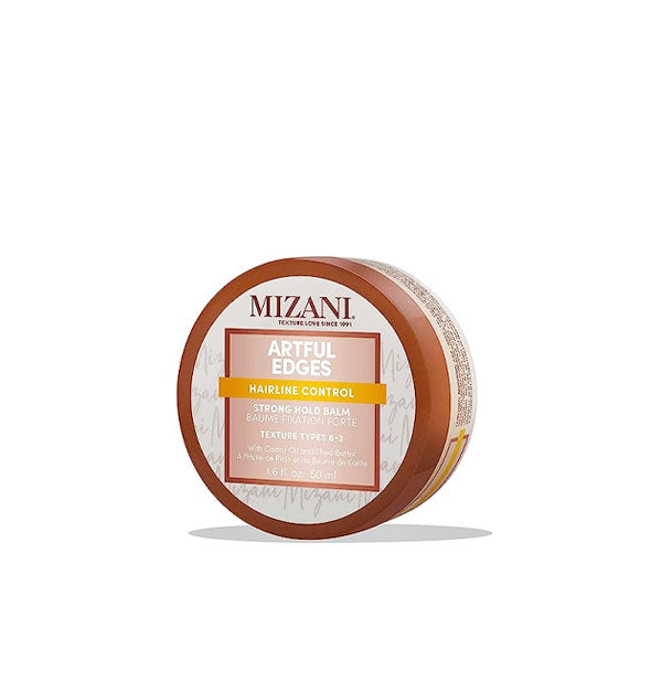Round 1.6 ounce pot of Mizani Artful Edges Hairline Control Strong Hold Balm on its side