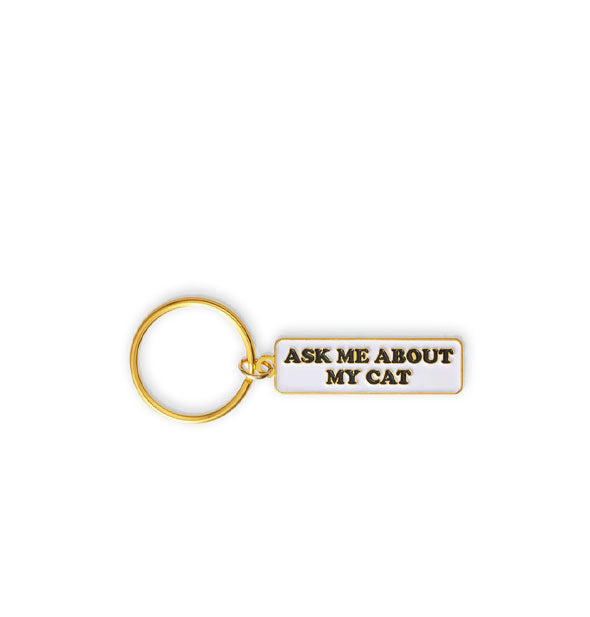 Rectangular white enamel keychain with gold edging and ring says, "Ask me about my cat" in black lettering