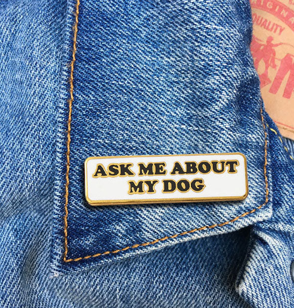 Ask Me About My Dog enamel pin on jean jacket lapel