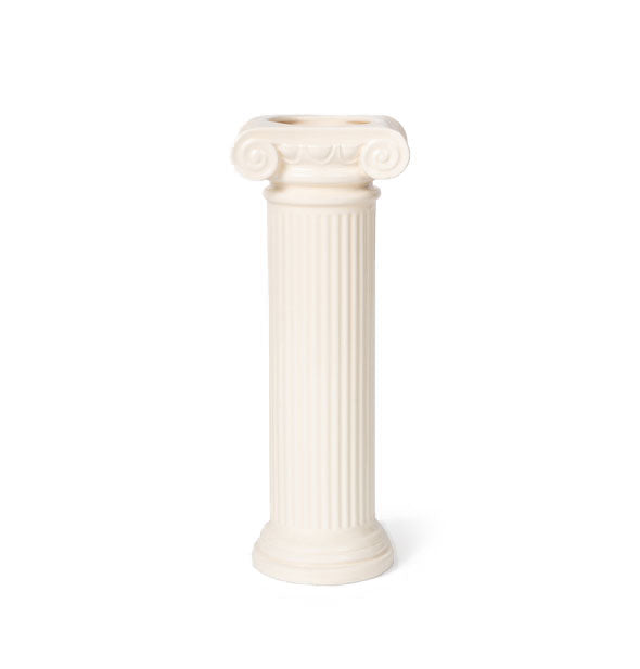 White flower vase that resembles an ionic column