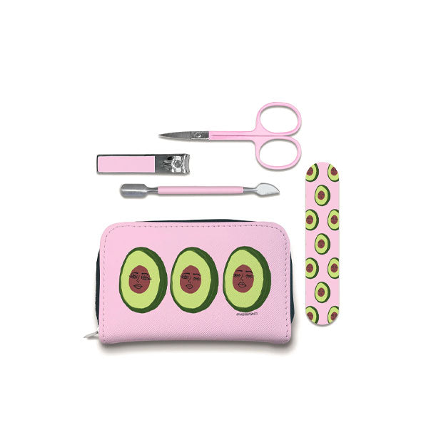 Pink manicure set with pouch and file featuring a print of halved avocados with pit faces in various stages of sleepiness also includes pink-handled clipper, cuticle pusher, and scissor