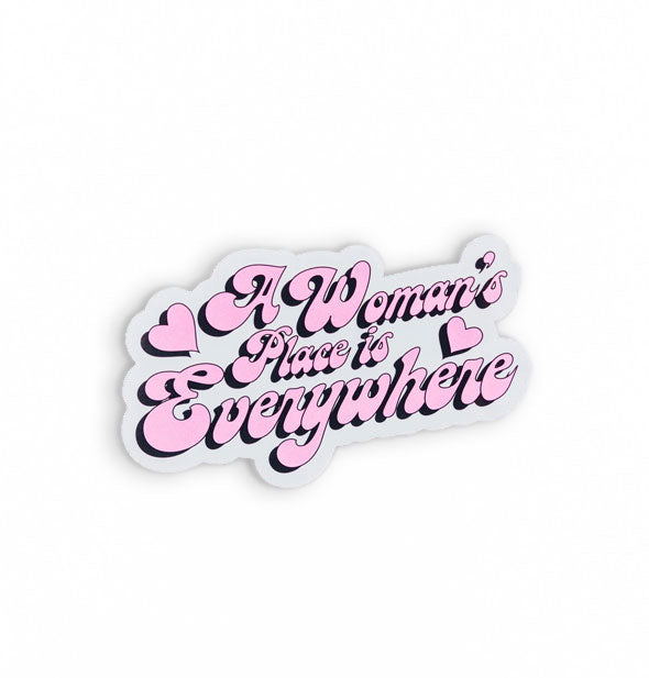 Sticker says, "A Woman's Place is Everywhere" in retro cursive pink font with heart accents