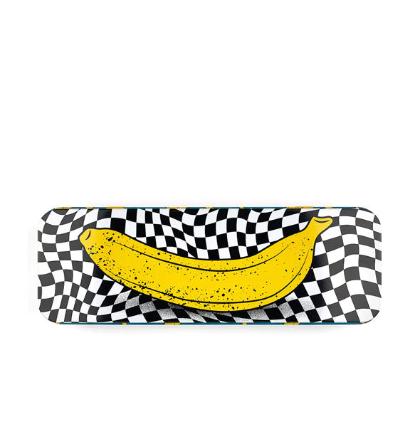 Rectangular box lid features a wavy black and white checker print overtop of which is a speckled yellow banana graphic