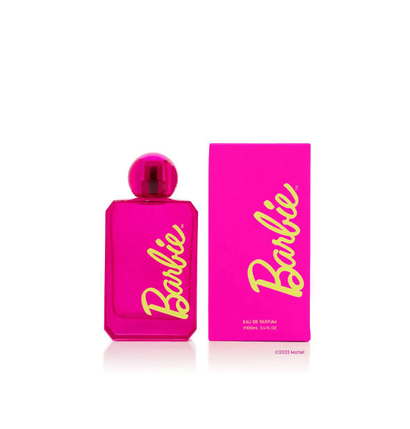 Pink bottle and box of Barbie Eau de Parfum with yellow "Barbie" logo on each and a round pink cap on the bottle