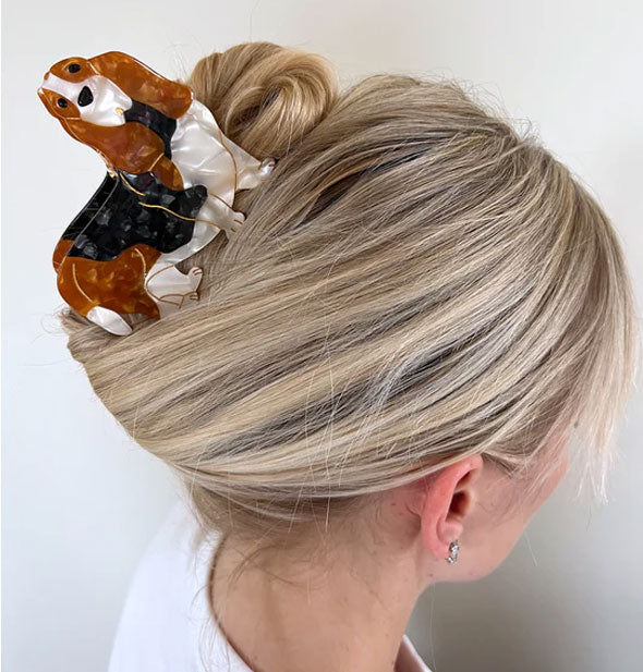 Model wears a Basset hound hair clip in a twisted updo style