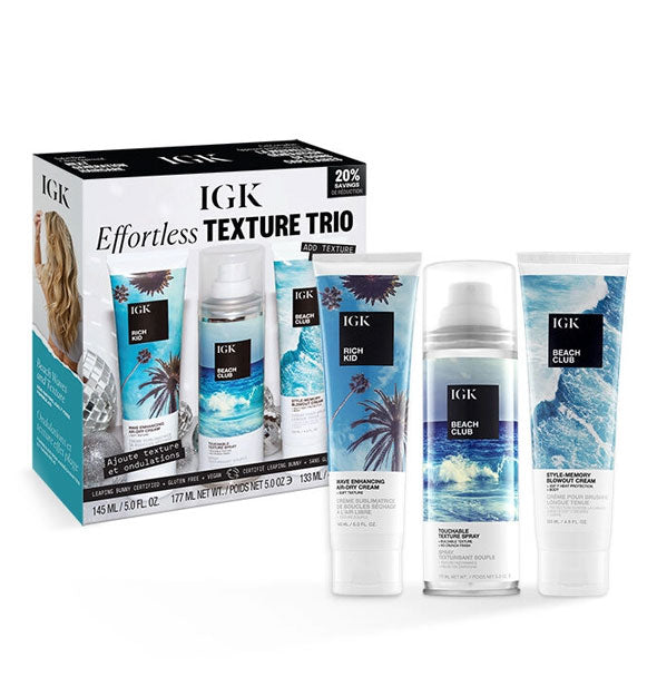 Box and contents of IGK's Effortless Texture Trio: Rich Kit Wave-Enhancing Air-Dry Cream, Beach Club Style-Memory Blowout Cream, and Beach Club Touchable Texture Spray