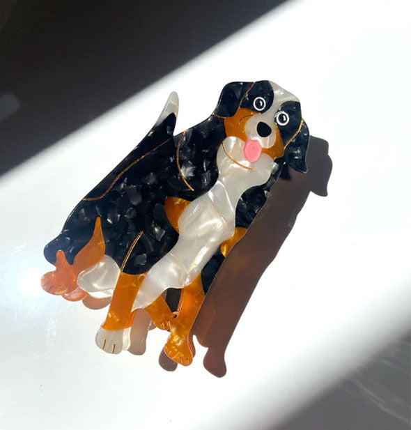 Brown, black, and white Bernese mountain dog hair clip with quartz-effect finish