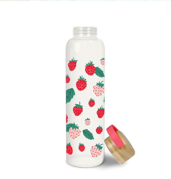 Tall glass strawberry print water bottle with bamboo lid removed